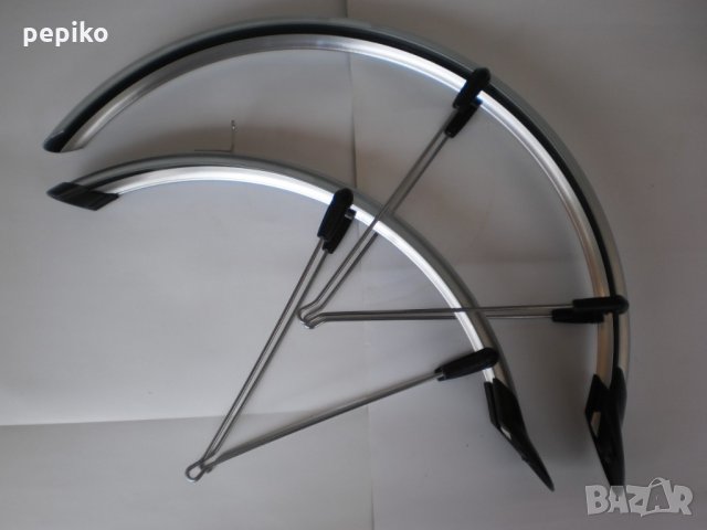 Продавам колела внос от Германия оригинални сребристи Италиански пластмасови калници 20 цола, снимка 1 - Аксесоари за велосипеди - 21865529