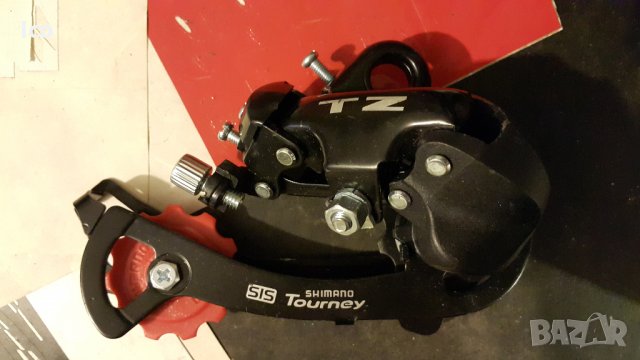 Shimano tz tourney заден дерайльор оптегач, снимка 1 - Части за велосипеди - 23722595