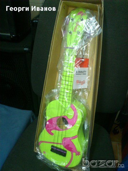 Продавам малка китарка Окулеле, чисто нова неизпозвана , снимка 1