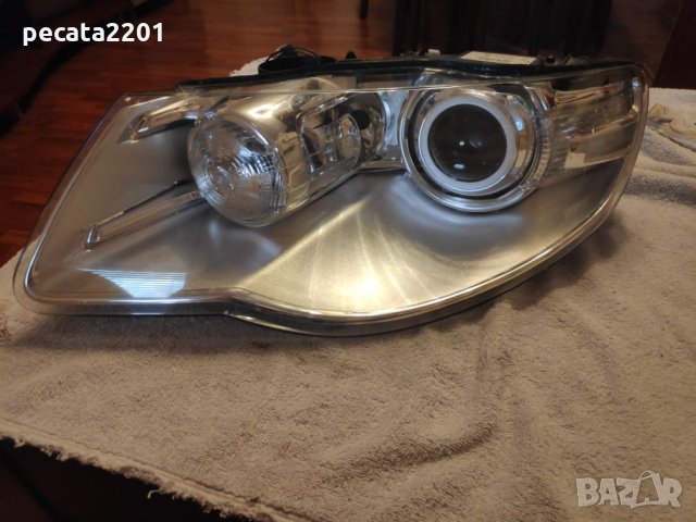 Продавам - оригинален ляв фар за Тоарег 2008 г.