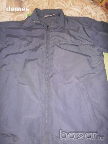 Тъмно синьо ветрозащитно яке Puma, размер L 