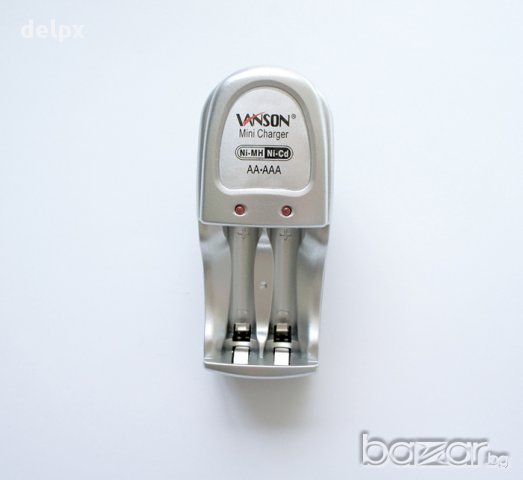 Мрежово зарядно V-80 за акумулаторни батерии AA (R06) / AAA (R03), снимка 1