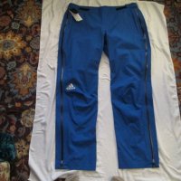 Adidas нов, с етикет син водоустойчив панталон с мембрана., снимка 1 - Спортни дрехи, екипи - 23204328
