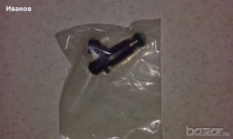 Продавам горивен инжектор за двигател VQ35DE, снимка 1