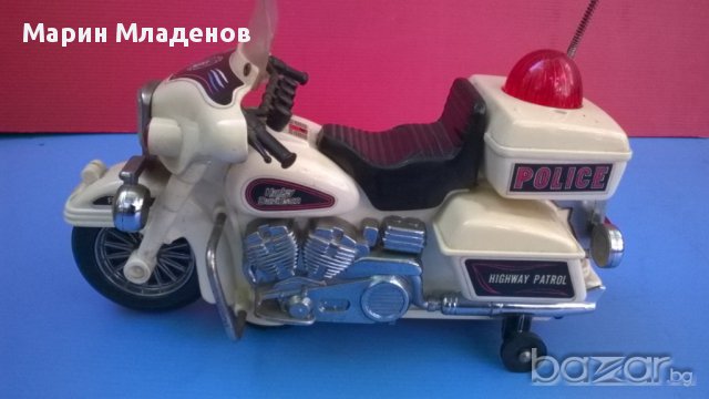 Стара детска играчка-полицейски мотор