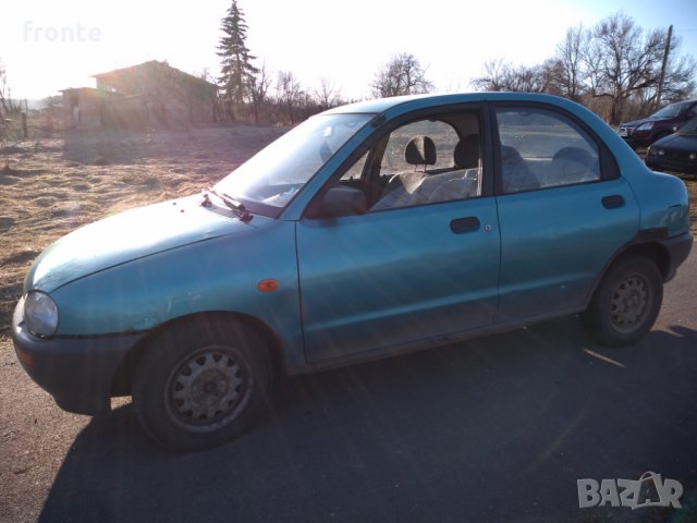 Mazda 121, снимка 6 - Автомобили и джипове - 11729604