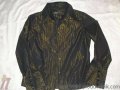 Ефектна черна риза на златно райе, снимка 1 - Ризи - 18181982