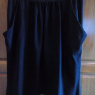 Къса черна асиметрична пола от трико с набор и джобове., снимка 2 - Поли - 14471845