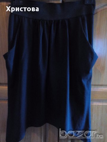 Къса черна асиметрична пола от трико с набор и джобове., снимка 2 - Поли - 14471845