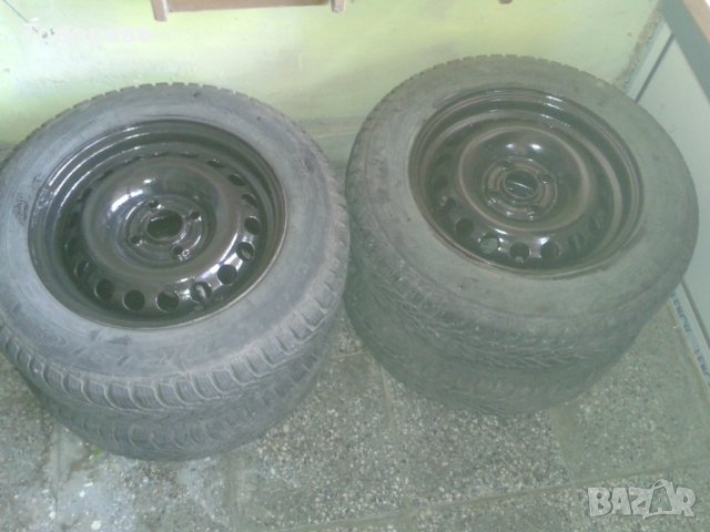 4 зимни гуми с джанти, снимка 1 - Гуми и джанти - 23281527