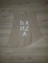 Дамска бежова пола с бял надпис марка Danza 