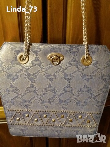 Дам.чанта-/изк.кожа/-цвят-светло синя. Закупена от Италия.