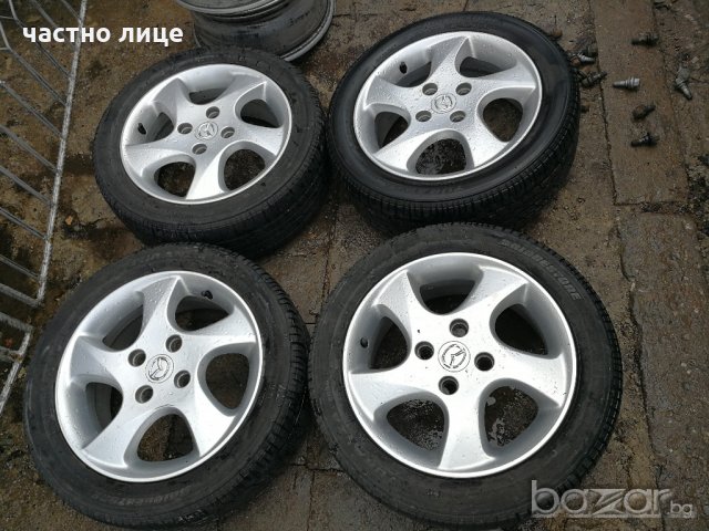 Mazda 2 оригинални джанти 15-ски с летни гуми Bridgestone, снимка 4 - Гуми и джанти - 20953443