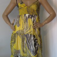Красива рокля в жълто, снимка 1 - Рокли - 7955698