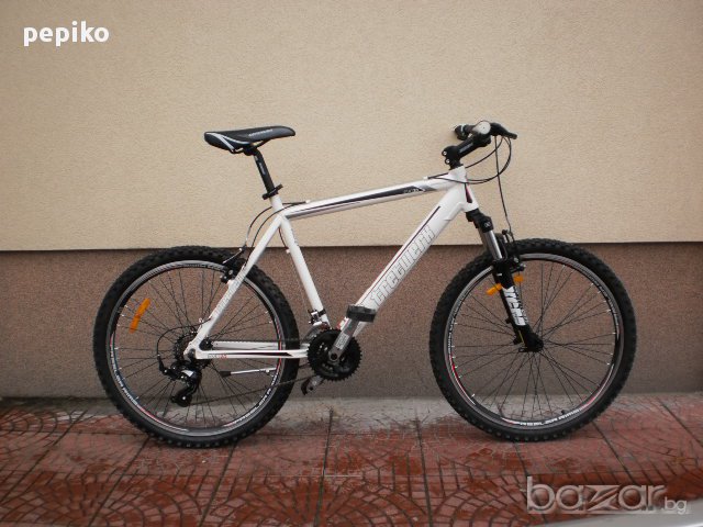 Продавам колела внос от Германия спортен велосипед tretwerk модел 2014г 26 цола бял, вибрейк, снимка 1 - Велосипеди - 10069957