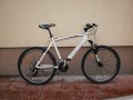 Продавам колела внос от Германия спортен велосипед tretwerk модел 2014г 26 цола бял, вибрейк, снимка 1
