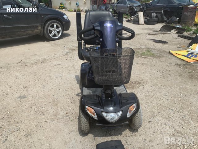 Скутер за трудно подвижни хора или инвалиди