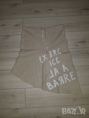 Дамска бежова пола с бял надпис марка Danza , снимка 2 - Поли - 23816147