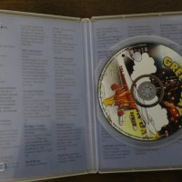 Green Day ‎– Dookie: The Ultimate Critical Review, снимка 3 - CD дискове - 23680955