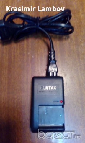 1 зарядно за фотоапарат., снимка 2 - Батерии, зарядни - 18205397