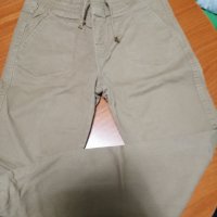 Нови бежови панталони с ластик размер 150, снимка 2 - Детски панталони и дънки - 22651319