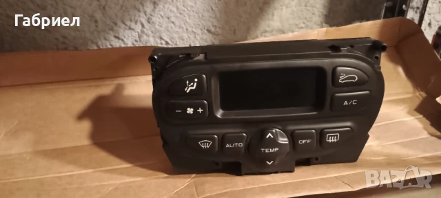 Конзола за климатроник на Пежо 206.