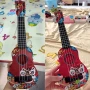 Младежка карикатурна китара укулеле за деца, 43,5x14,5 см.,4 струни, Детска играчка Укулеле Материал, снимка 4