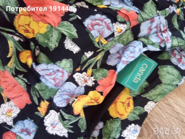 Елегантна дамска пола на цветя, ефирна и лека материя, Марка Canda размер 42, снимка 3 - Поли - 50585176