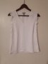 Нова блузка H&M XS 34 размер бяла с волани, снимка 1 - Корсети, бюстиета, топове - 37252564