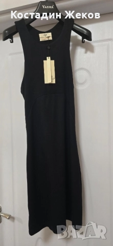 Нова със етикет .Дамска оригинална рокличка. ENVII 