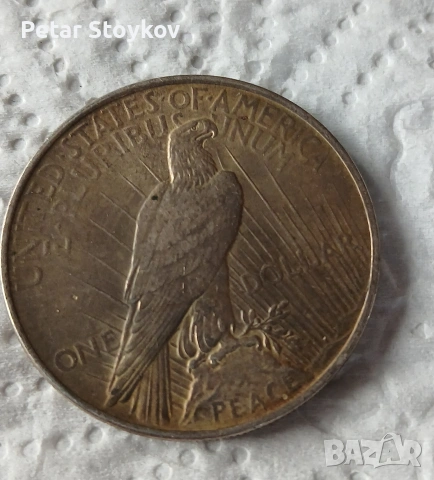 Стара сребърна монета.