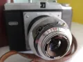 Фотоапарат Dacora Digna

. 1950 г., снимка 3