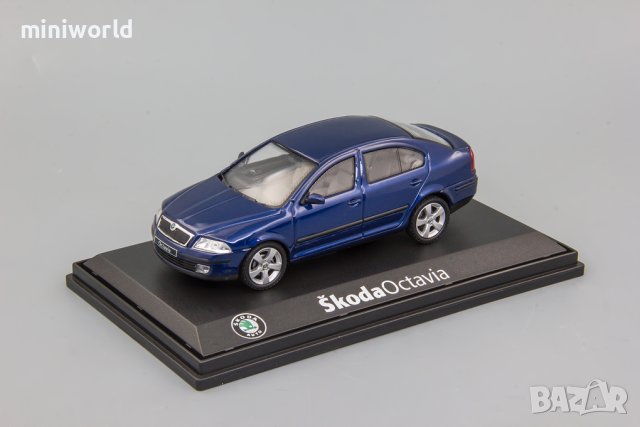 Skoda Octavia II 2004 - мащаб 1:43 на Abrex моделът е нов в PVC дисплей-кейс