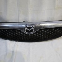 Предна решетка с емблема Мазда 626 99г Mazda 626 1999, снимка 1 - Части - 43313442