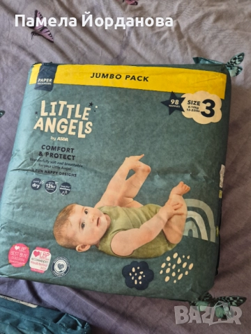 Три пакета памперси тройка