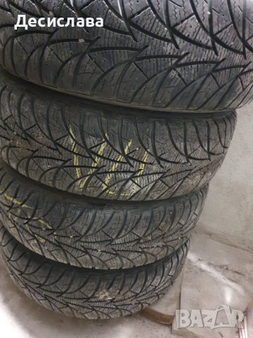 Зимни гуми + метални джанти + тасове за Опел, снимка 2 - Гуми и джанти - 42993811