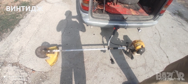 тример трион косачка за трева немски