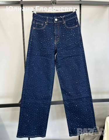Нови дънки с камъни ,отговарят на 42номер еластични с етикет ,размер L 59.00 лв.