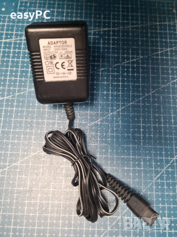 Оригинален захранващ адаптер KHG030030D-2 3V 300mA, снимка 2 - Друга електроника - 53414838