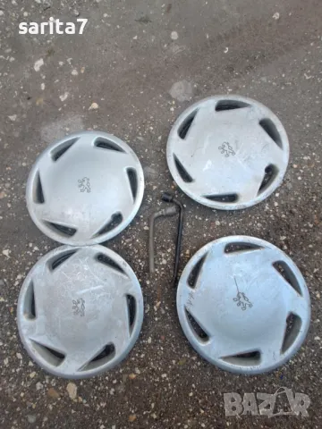 Комплект от 4 броя тасове за Пежо / Peugeot и два джантови ключа към тях 