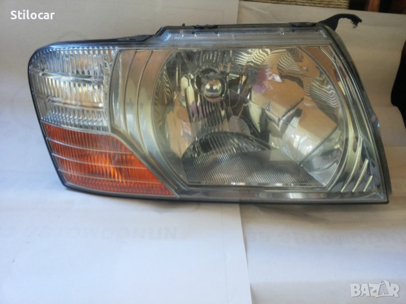 Фар Mitsubishi Padgero 03-06г ел.десен, снимка 1
