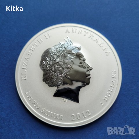 2 oz Лунар 2012 г. - UNC, снимка 2 - Нумизматика и бонистика - 42977550