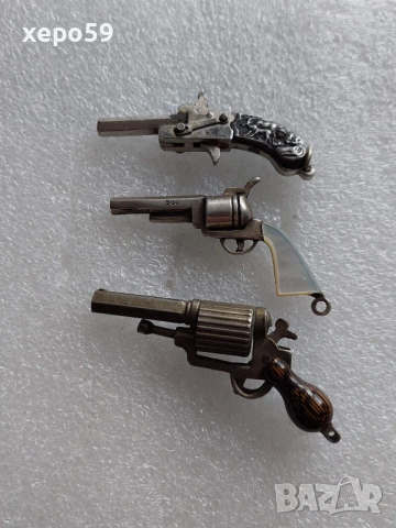Миниатюрни сребърни пистолети-сребро 900/цена за трите 500 еу., снимка 2 - Антикварни и старинни предмети - 53012458