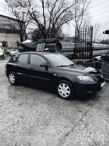 Мазда 3 
