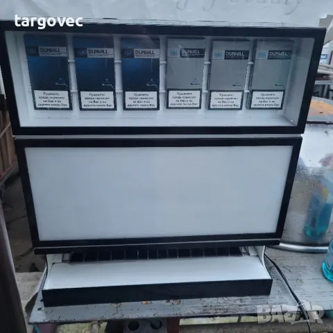 светеща реклама тип диспенсър за цигари