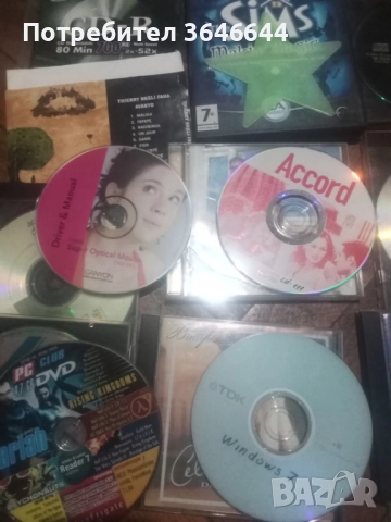 Към 50 броя компактен дискове и ДВД филми, снимка 1