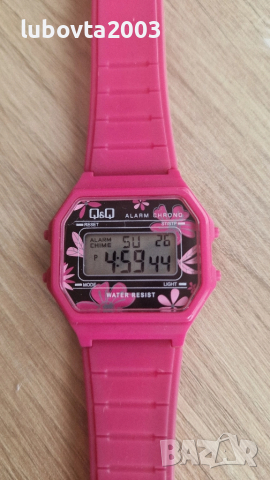 QiQ Дамски цикламен часовник 