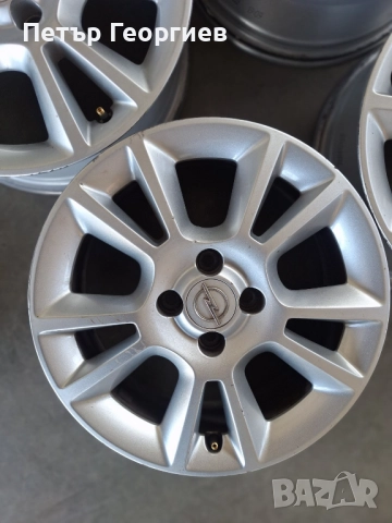 ОРИГИНАЛНИ АЛУМИНИЕВИ ДЖАНТИ-ОПЕЛ -4Х100Х56.6-16 ЦОЛА, снимка 3 - Гуми и джанти - 52909495