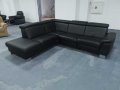 Черен кожен ъглов диван "Boreas" с релаксиращ механизъм, снимка 1 - Дивани и мека мебел - 39394554