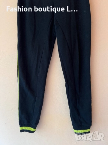 Черен спортен анцунг с паднало дъно тип потур с неонова лента отстрани и на глезените и джоб отпред , снимка 2 - Спортни екипи - 52167290